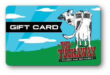The Tuckaway logo, cartoon cow on field with logo branded on cows bottom